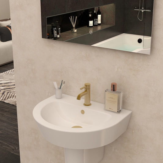 Plastic basin overflow cover in brushed brass